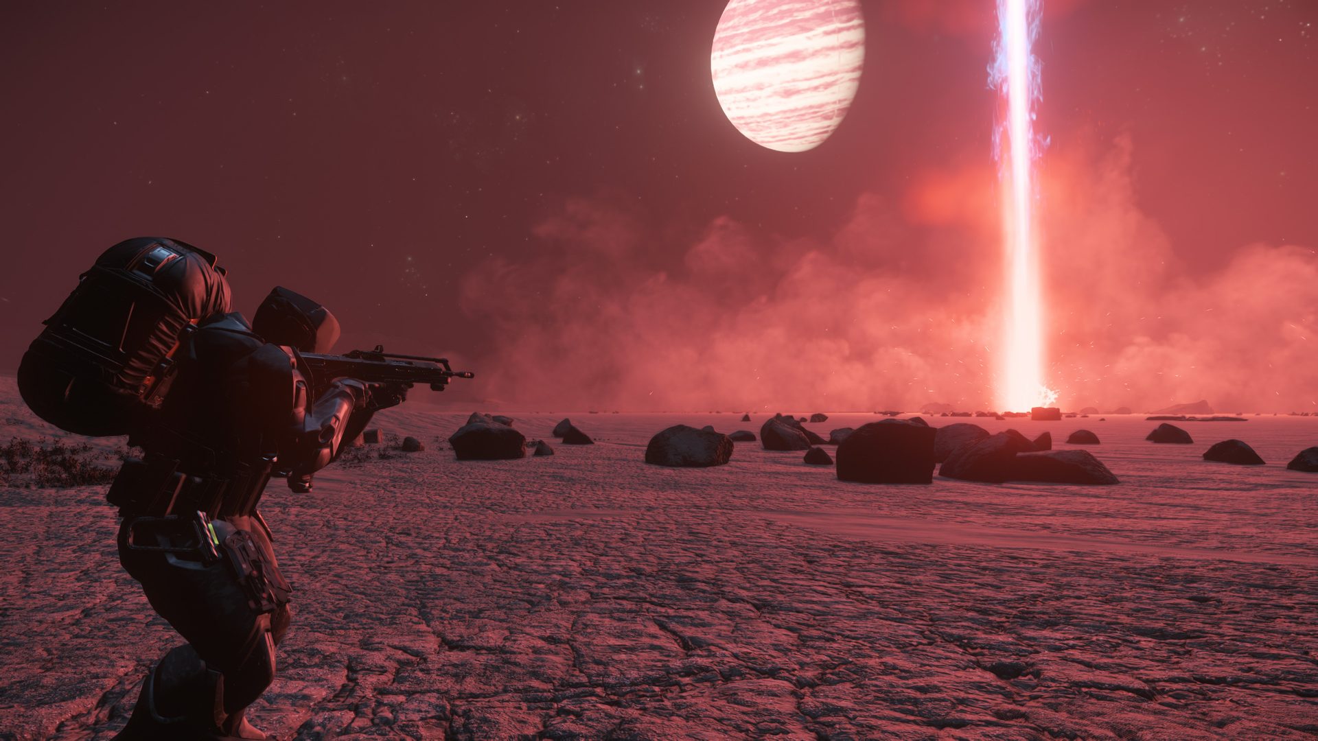 Membre de DAWNSTAR en armure, arme en joue, sur une planète rouge face à une colonne de lumière, dans Star Citizen